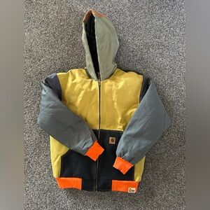 Upcycled Carhartt jacket made by The Morgan factory size up to a large.